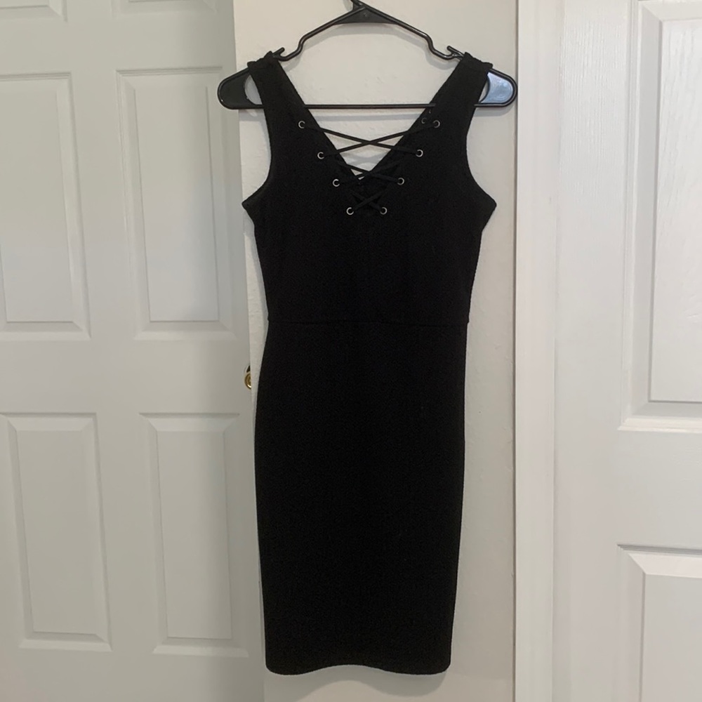 Tight black knee length dress